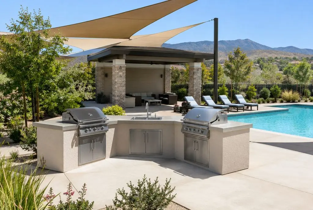 Illustration: two stucco BBQ islands with stainless grills beside a community pool cabana in a Santa Clarita planned community